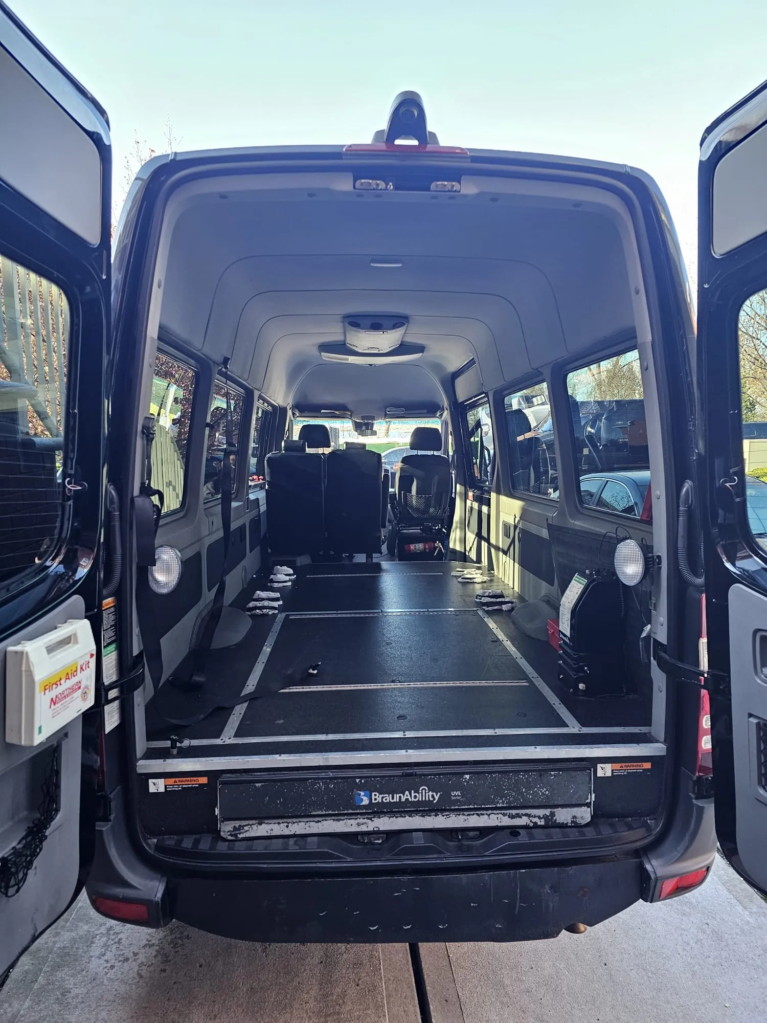 Wheelchair-accessible Sprinter with rear lift and wheelchair securement space