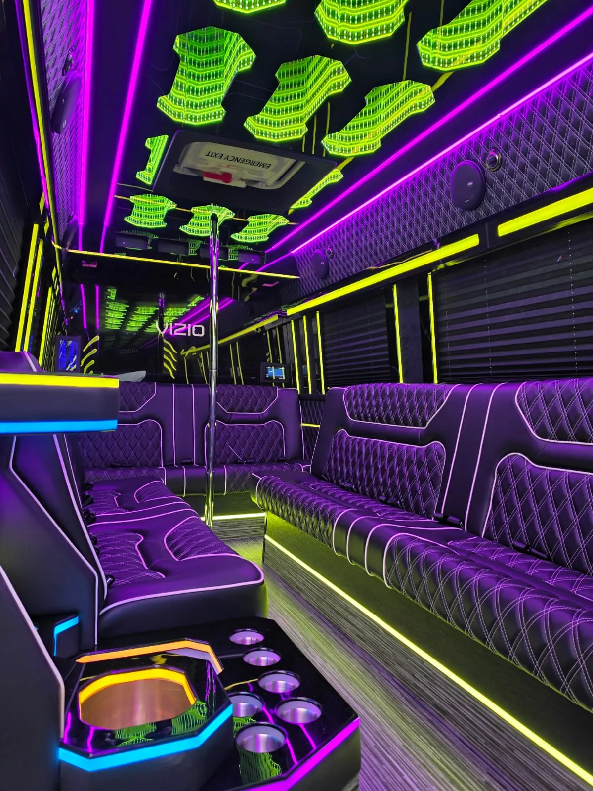 Limo Sprinter cabin with perimeter lounge seating and ambient lighting